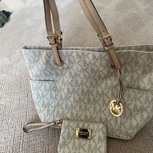 Cream and tan Michaels kors bag and wristlet